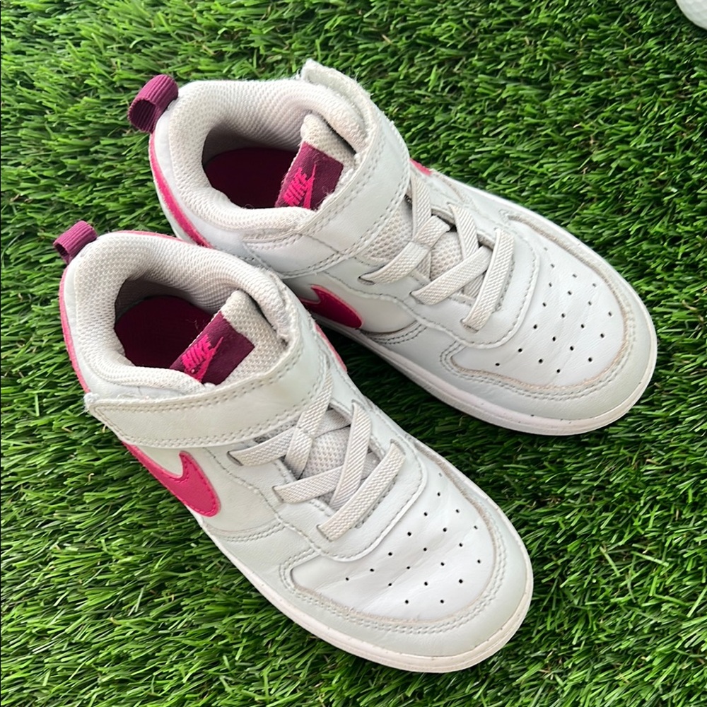 Nike White and Pink Sneakers with Classic Design